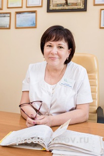 Фотография с изображением руководителя